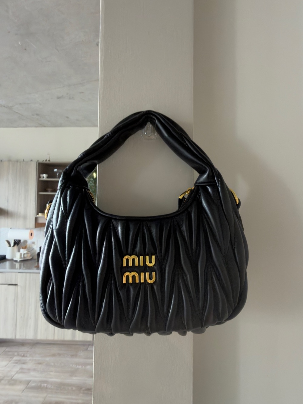 Miu Miu Black Matelassé Leather Mini Hobo Bag Gold Logo